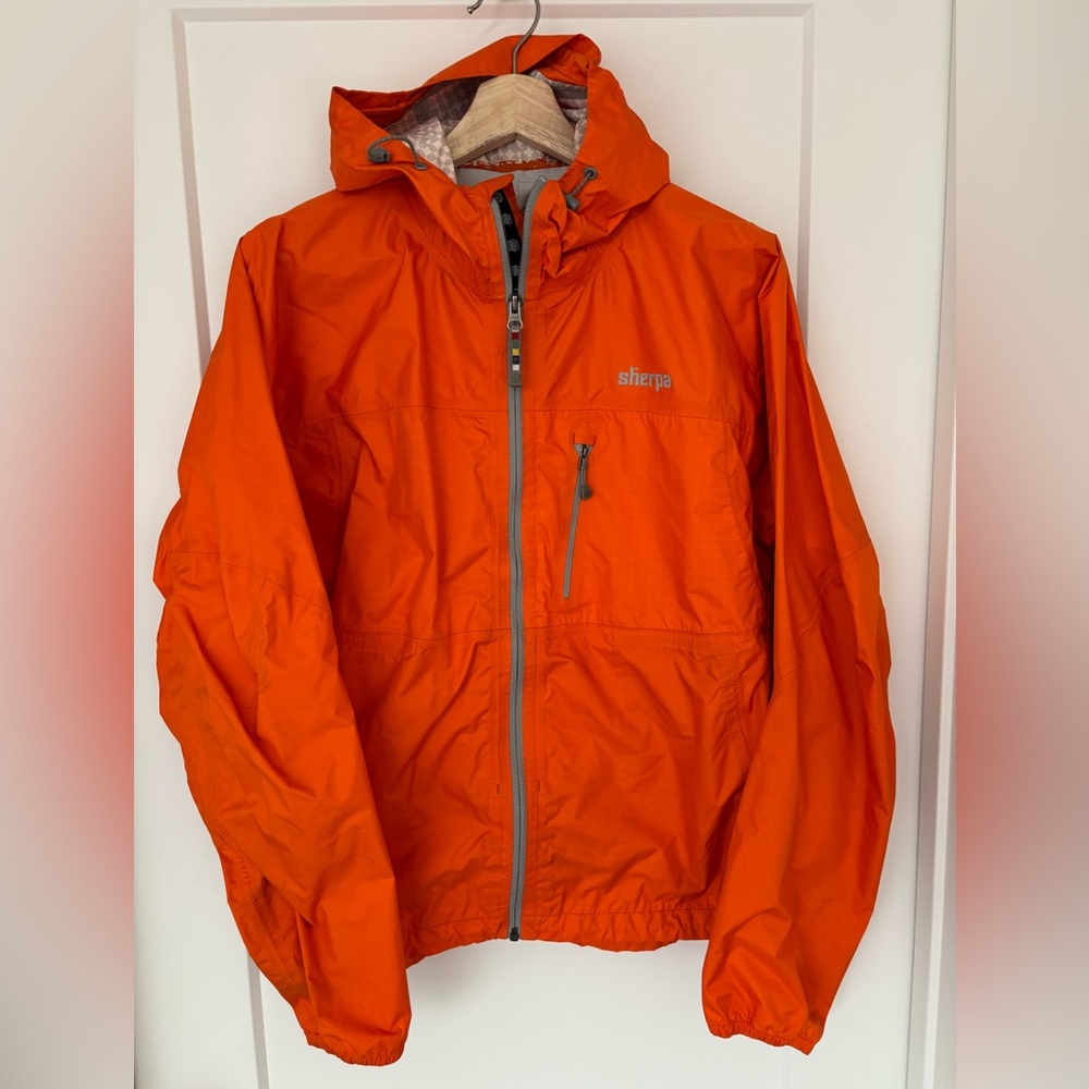 Sherpa Vibrant Orange Rain Jacket - Women’s Size Medium